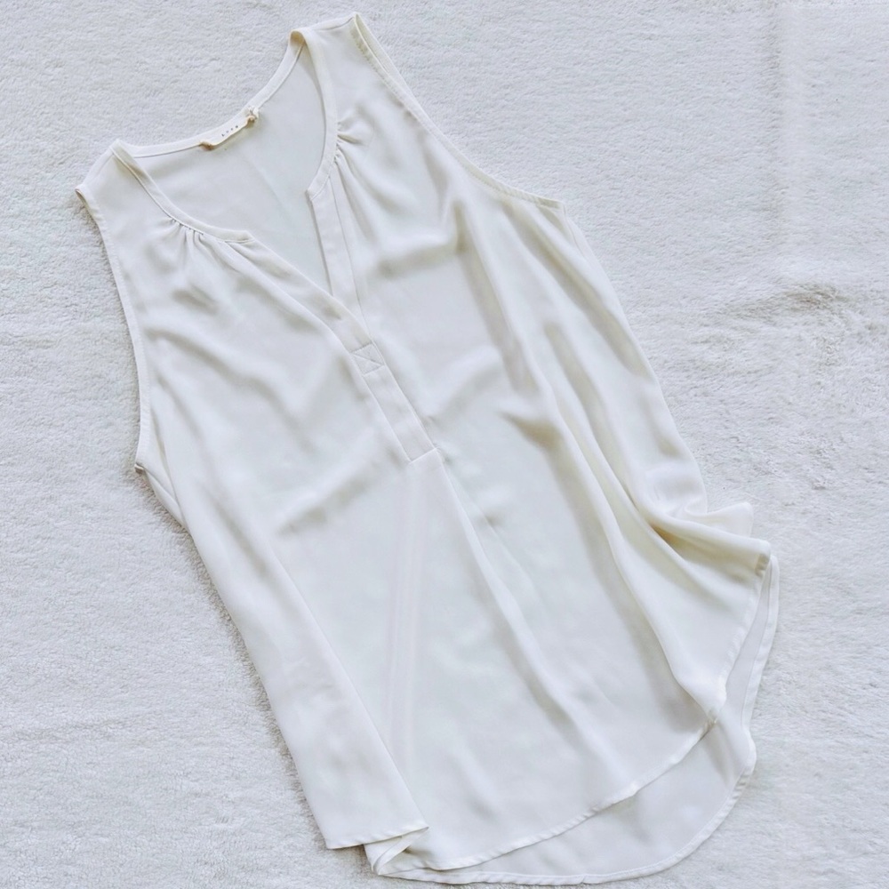 semi sheer sleeveless blouse